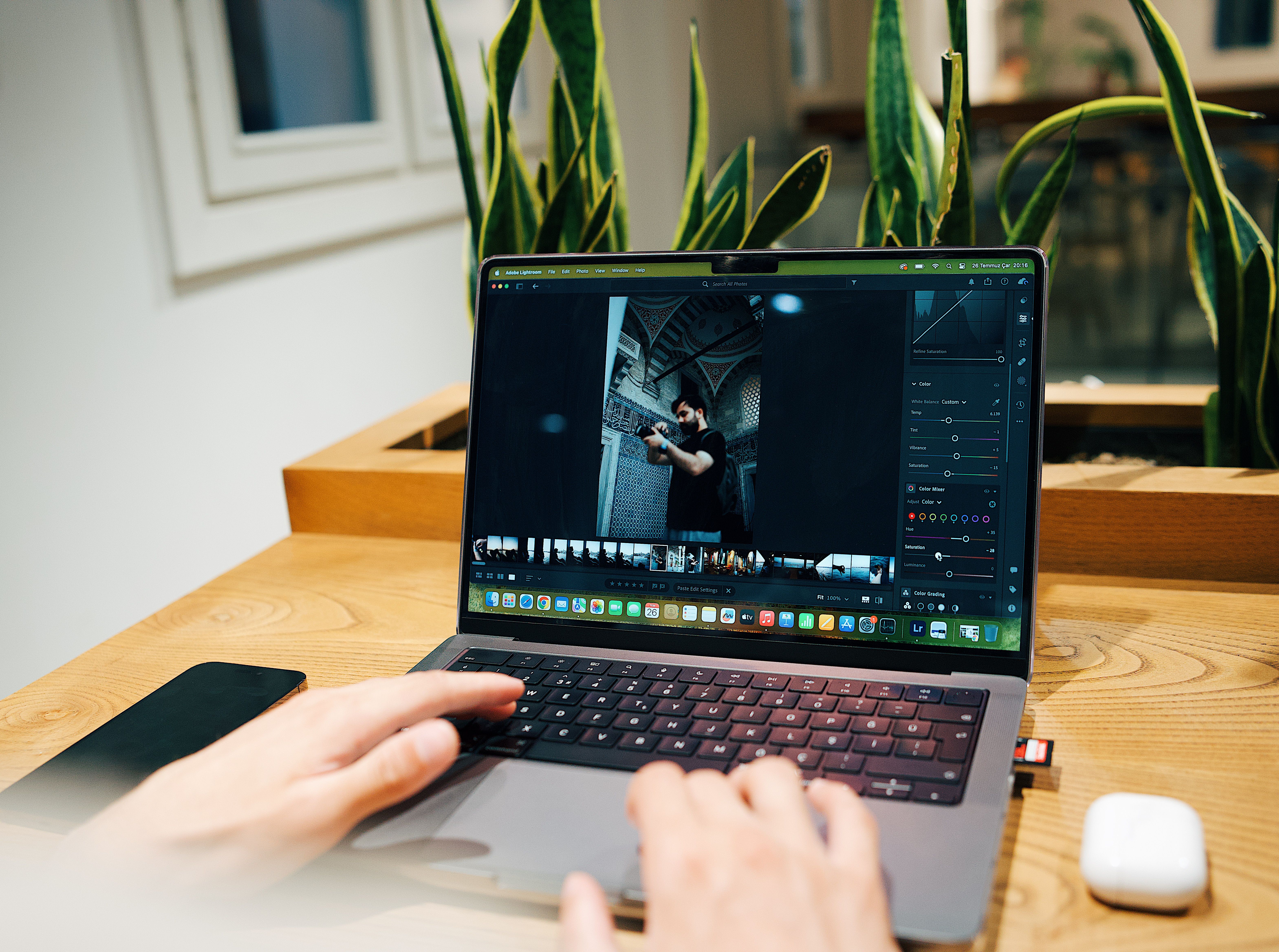 Videographer working with professional camera equipment
